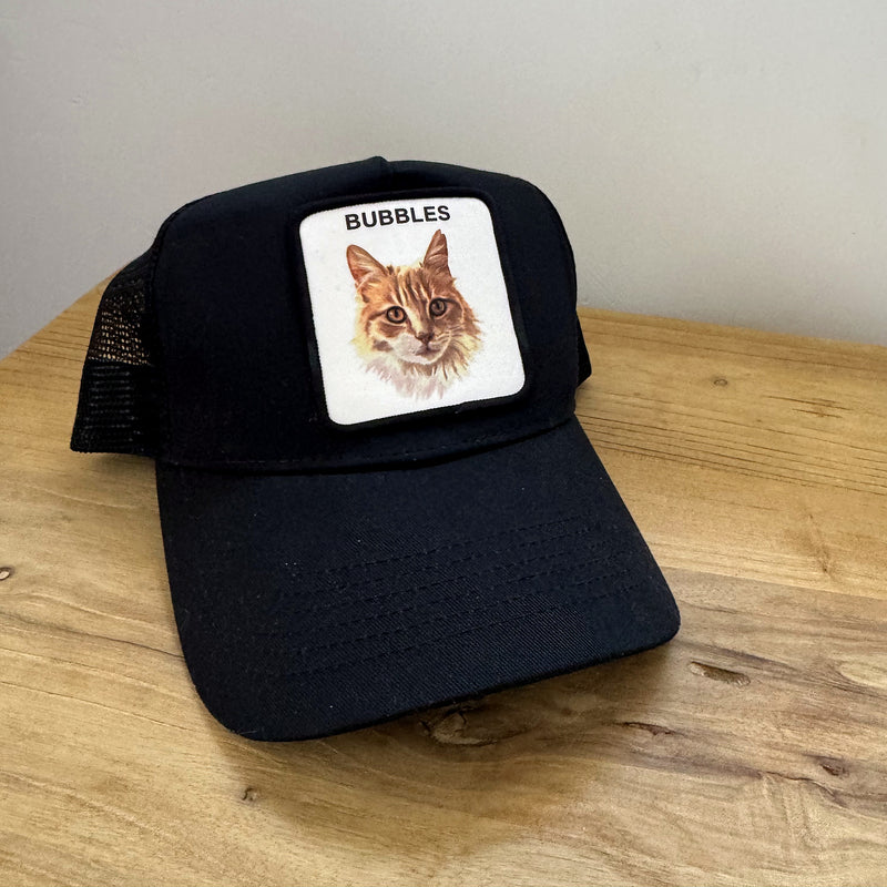 The finished trucker cap with the pet portrait patch